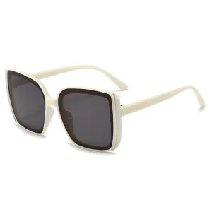 Oversized square sunglasses with ivory frames and dark gray gradient lenses, 45-degree view