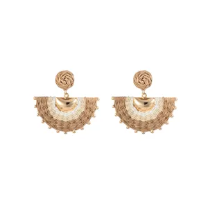 Pair of woven earrings with round studs, brown and ivory semicircle drops, gold arc and bead accents
