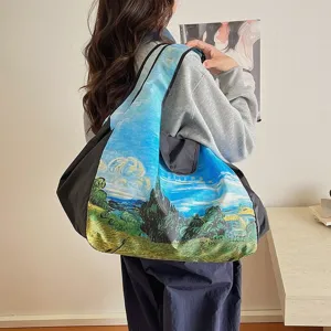 Large foldable tote bag with colorful oil-painting landscape print, shown carried over the shoulder