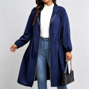 Model wearing a navy hooded long coat with a cinched drawstring waist and elastic cuffs