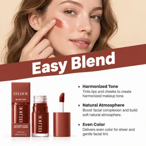 Close-up of a model blending warm cherry-red cheek tint, with liquid tint bottles and swatch below.