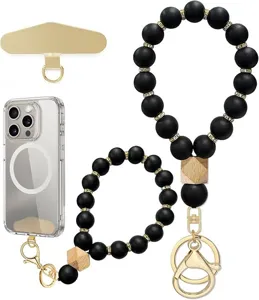 Black beaded wrist straps with gold spacers, wooden accents, phone tether tab and clear case