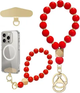 Red silicone bead wrist straps with gold-tone clasps, wooden cube beads, phone patch and clear case