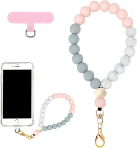 Pastel bead strap with pink, gray and marble-white beads, wood accent, gold clasp and phone patch