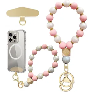 Beaded phone wrist strap with pink and pearl-white silicone beads, gold-tone charms and clips