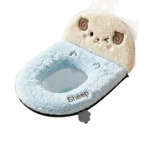 Plush toilet seat cover in light blue and cream, featuring a cute sheep design and soft fleece