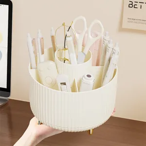 Organizer da scrivania rotondo e girevole in plastica color crema, con scomparti e piedini dorati