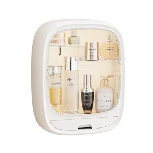 White wall-mounted cosmetics organizer with clear front, drawer, and skincare bottles