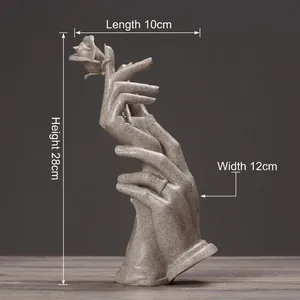 Artistic hands holding a rose sculpture with detailed texture and ring detail