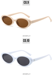 Detail view of oval retro sunglasses in beige and white with resin frames at 45 degree angle