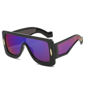 Futuristic oversized square sunglasses with high-gloss black frame and magenta mirrored lenses