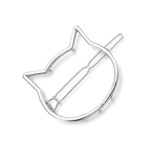 Detailed close-up of a silver hollow cat-shaped hair clip made of polished alloy metal
