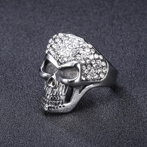 Silver punk style skull ring in titanium steel with sparkling rhinestones on the forehead