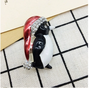 Detail of penguin brooch with alloy drip oil and sparkling rhinestones for Christmas