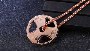 Detail of rose gold dumbbell pendant with LIVE FIT engraving and matching box chain