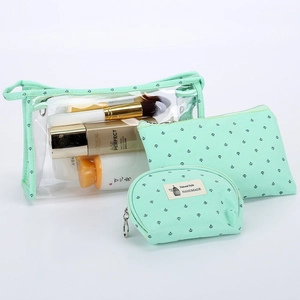 Three-piece clear PVC and mint green anchor travel toiletry bag set for women