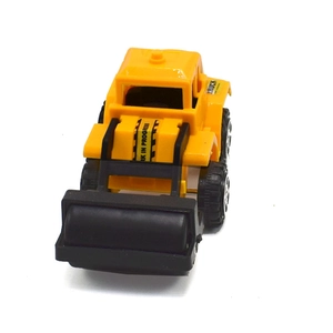 Close-up of yellow plastic toy steam roller with black drum and TRUCK decal
