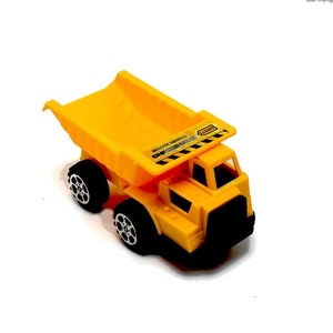 Detail view of a yellow plastic toy dump truck with movable bed and engineering stickers