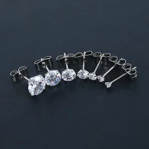 Detail showing seven sizes of round zircon stud earrings in silver stainless steel finish