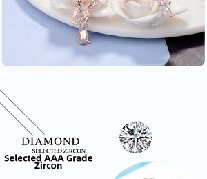 Detailed macro view of long rose gold drop earrings with sparkling AAA grade zircon