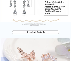 Macro detail of long flower earrings with water drop zircon in silver and rose gold