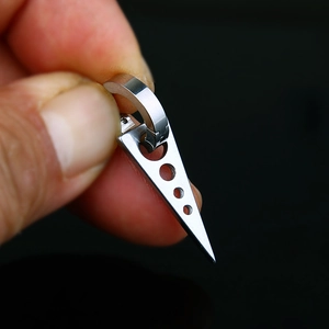 Silver triangle punk earring in titanium steel with four circular hollow accents