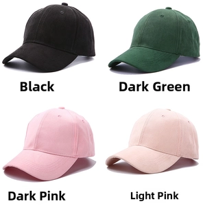 Detail view of winter suede baseball caps in black, dark green, deep pink and light pink