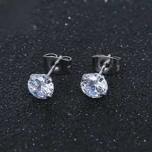 Detailed macro view of silver round cubic zirconia stud earrings with four-prong setting