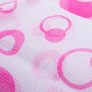 Detail of soft nylon bath towel featuring embossed texture and pink peach patterns