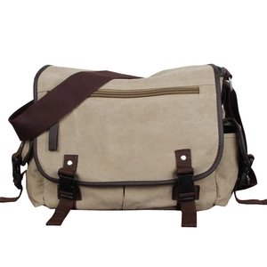 Khaki canvas messenger bag with brown trim and dual buckle closure for men