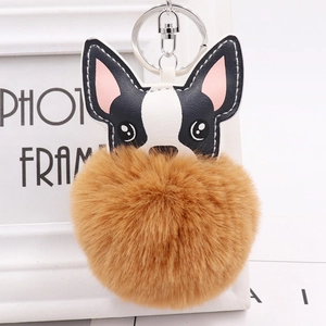 Cute bulldog faux leather keychain with large fluffy brown pompom and silver ring