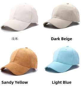 Detail view of suede baseball caps in off-white, dark beige, tan, and light blue colors
