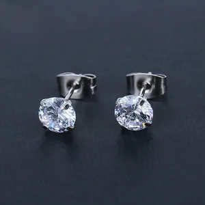 Macro shot of silver stainless steel stud earrings with four-claw round cubic zirconia