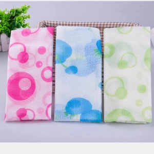 Three long exfoliating nylon bath towels in pink blue and green with bubble patterns