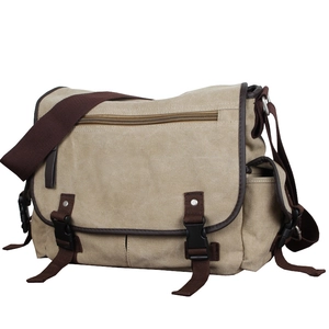 Vintage khaki canvas messenger bag with adjustable buckles and front zipper pocket