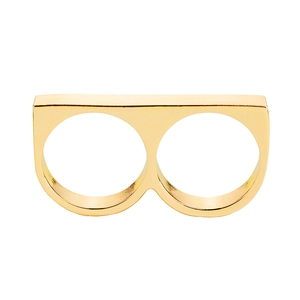 Close-up of golden double finger ring with a minimalist flat rectangular top design