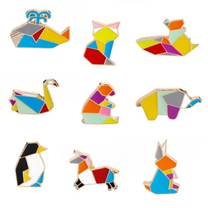 Detailed grid of geometric origami animal brooches with colorful enamel inlays