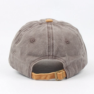 Rear view of washed grey baseball cap showing yellow contrast strap and metal buckle