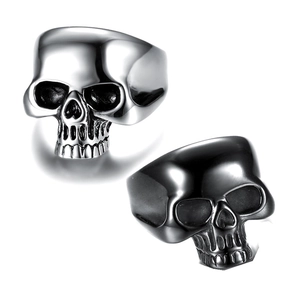 Polished silver and matte black punk skull rings in durable stainless steel for men