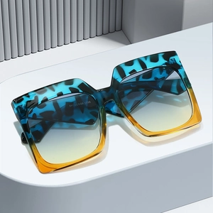 Fashionable oversized square sunglasses with blue leopard and orange gradient frame