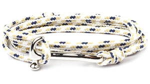 Macro detail of multi-layered woven rope bracelet with hammer-shaped metal buckle