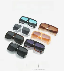 Detailed collection of oversized square sunglasses in black, white, and gradient colors