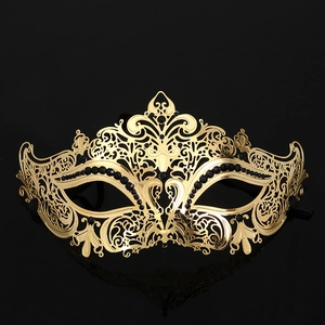 Elegant gold filigree masquerade mask for women with black rhinestones for Halloween parties