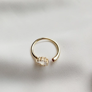 Detail view of gold S925 sterling silver ring with water-drop zircon and S925 stamp