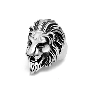 Detailed close-up of a silver lion head ring featuring intricate carved mane textures