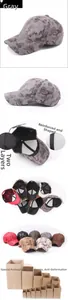 Close-up of camouflage baseball cap showing durable double-layer fabric and reinforced stitching