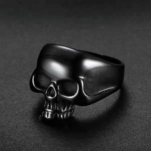 Gothic punk style skull ring for men in matte black stainless steel at a 45-degree angle
