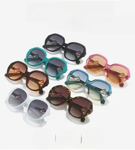 Detailed grid of vintage oval sunglasses in seven colors with gradient lenses