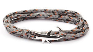 Detail of grey braided shark bracelet with silver hook and orange accents for men