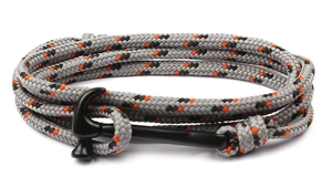 Close-up of woven paracord shark bracelet with black hammerhead shark anchor clasp